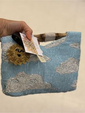 Blue Beaded Cloud-Print Handbag with Gold Lion Charm